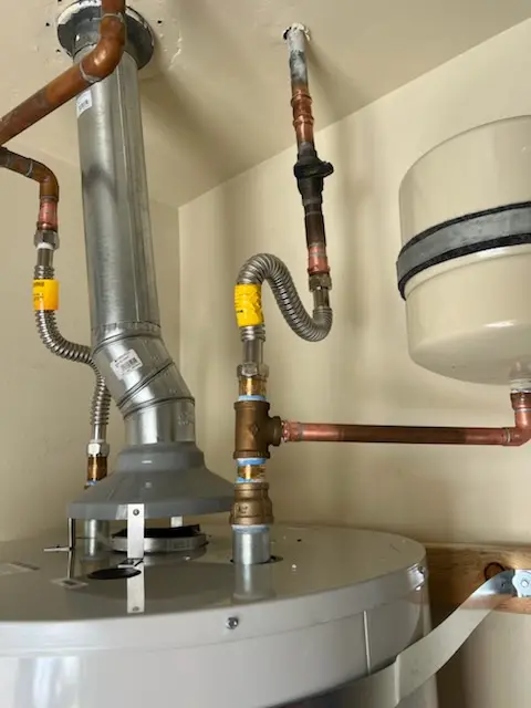 Water heater installation and plumbing repair in Island
